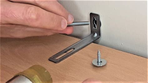 using metal l brackets to attach bookcase to walls|anchoring bookshelves to wall.